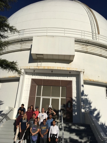 group in front of 120" telescope dome